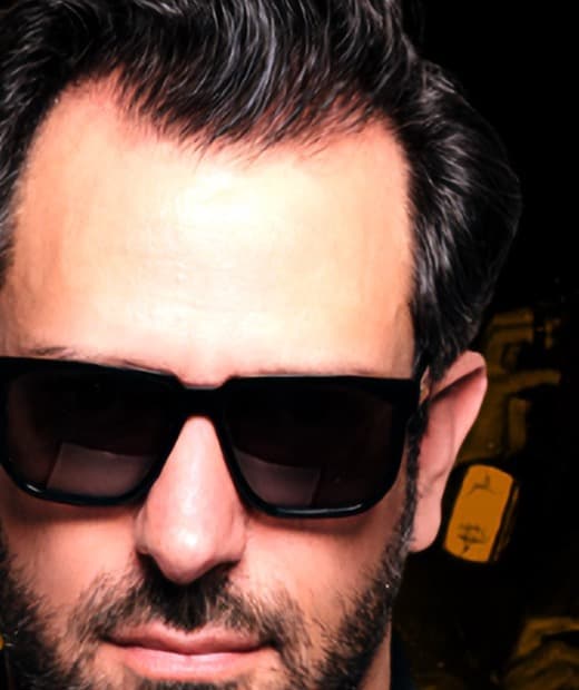 Guy Manoukian in dark glasses, from his March 2024 concert poster